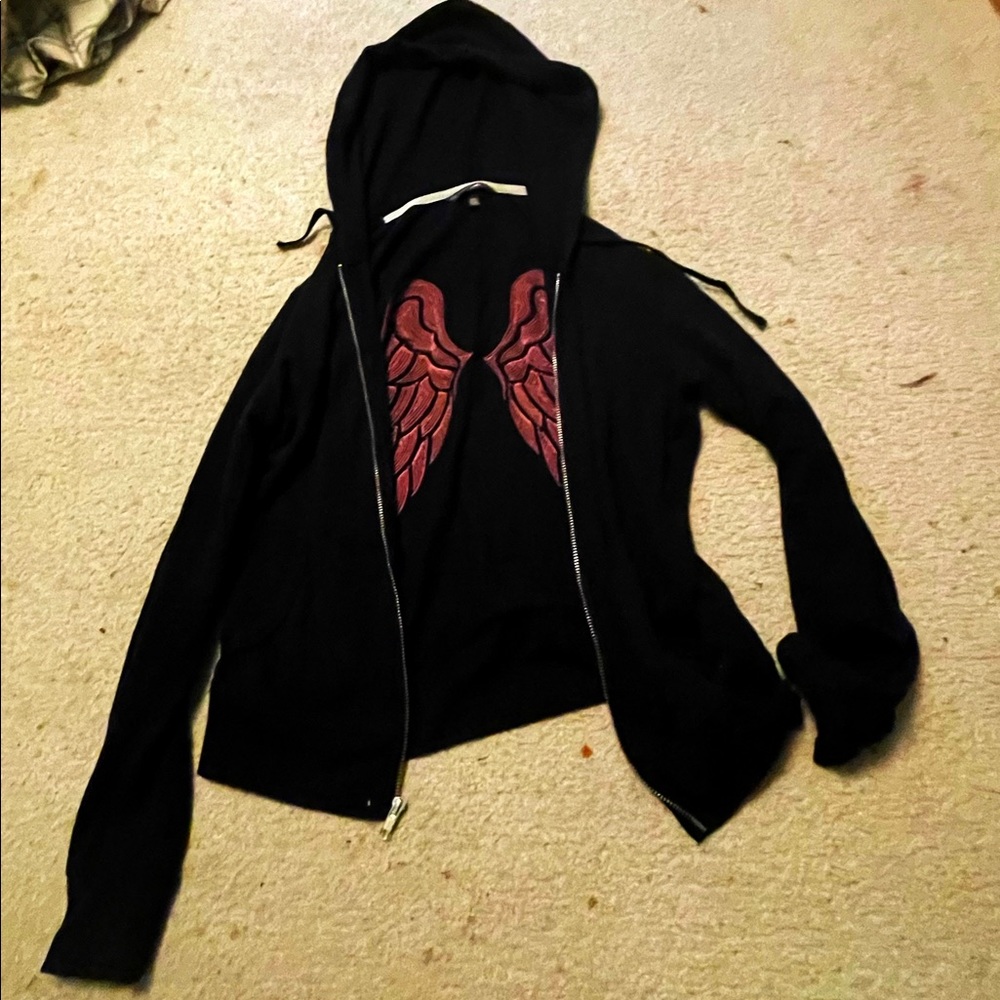 Victoria’s Secret (XS) black jacket, glitter wings